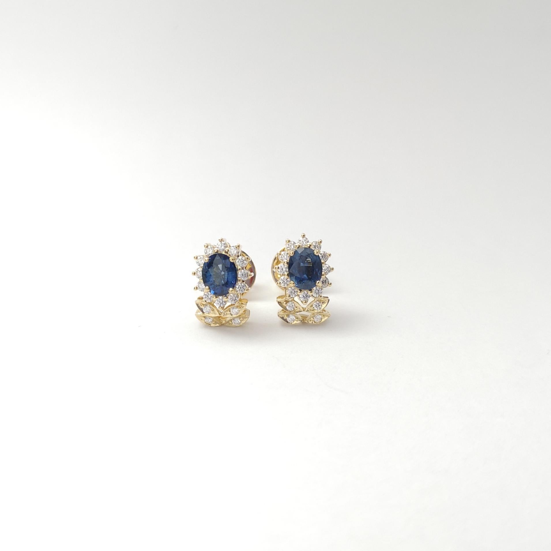 Oval Cut Blue Sapphire with Diamond Earrings set in 18K Gold Settings For Sale