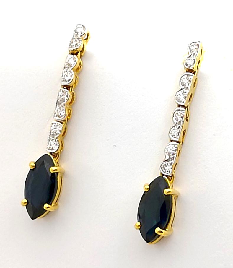 Women's Blue Sapphire with Diamond Earrings set in 18K Gold Settings For Sale