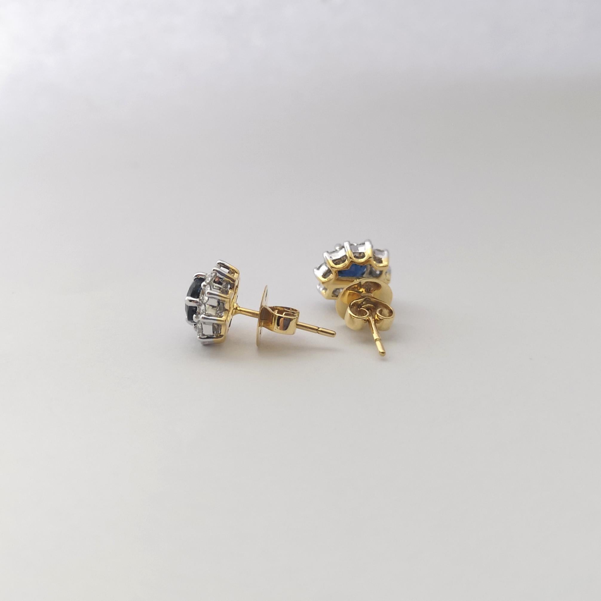 Women's Blue Sapphire with Diamond Earrings set in 18K Gold Settings For Sale