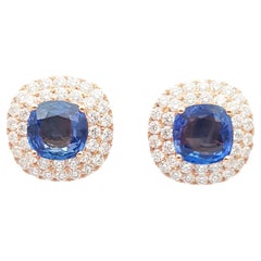 Ohrringe aus 18 Karat Roségold mit blauem Saphir und Diamanten in Fassungen