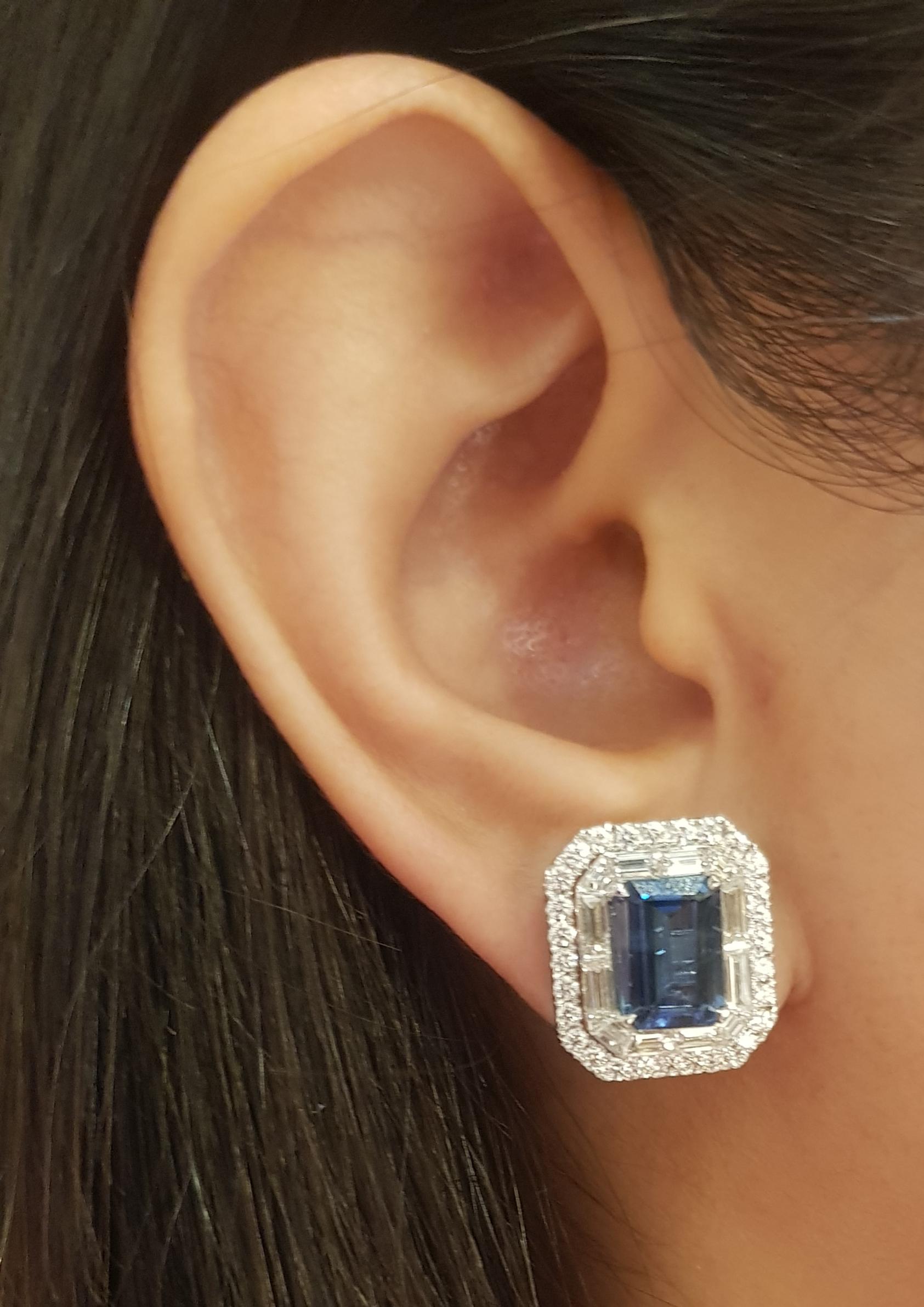 Blue Sapphire 5.84 carats with Diamond 3.07 carats Earrings set in 18K White Gold Settings

Width: 1.5 cm 
Length: 1.7 cm
Total Weight: 13.12 grams

