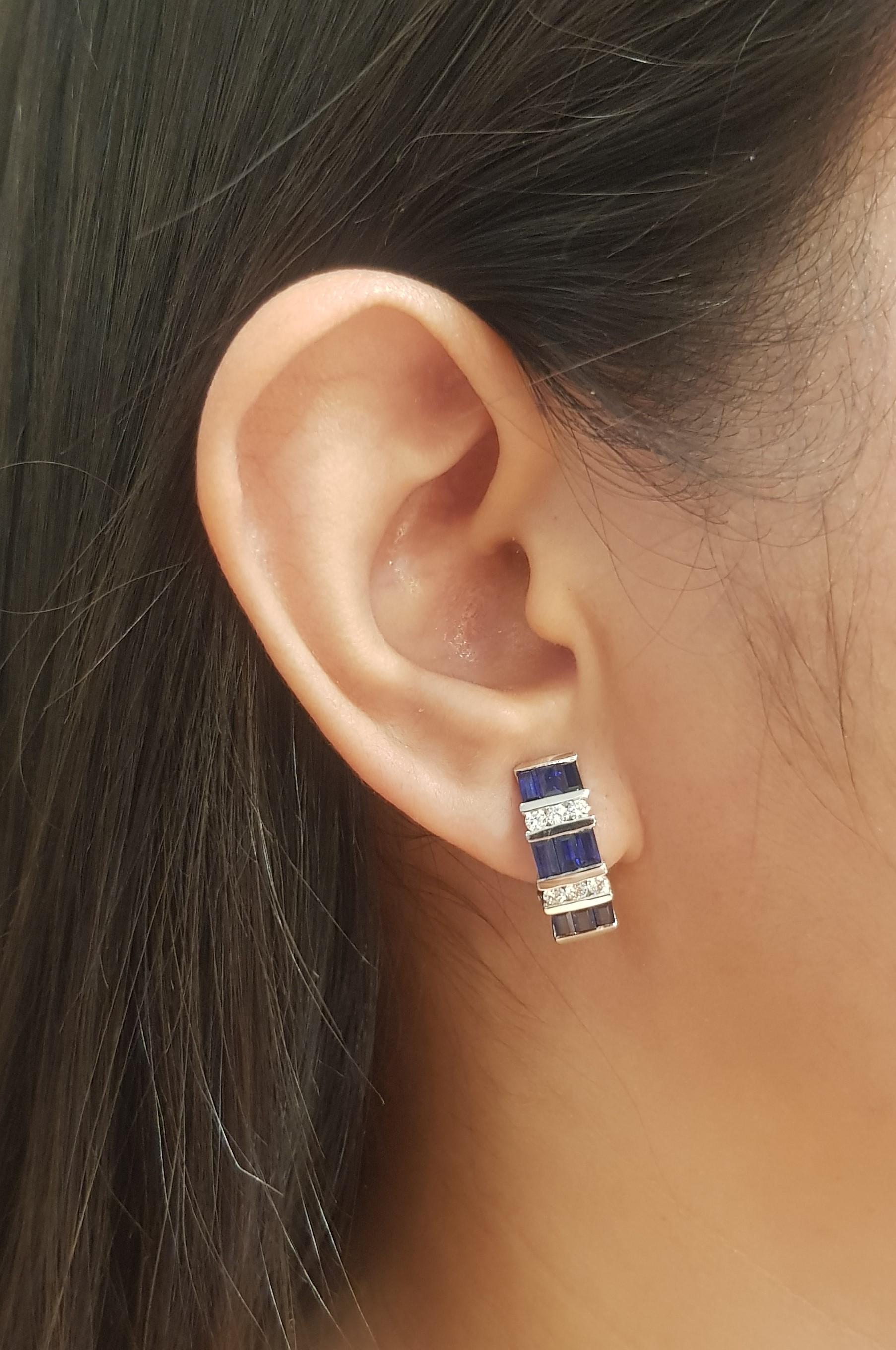 Blue Sapphire 2.60 carats with Diamond 0.44 carat Earrings set in 18K White Gold Settings

Width: 0.6 cm 
Length: 1.8 cm
Total Weight: 8.09 grams

