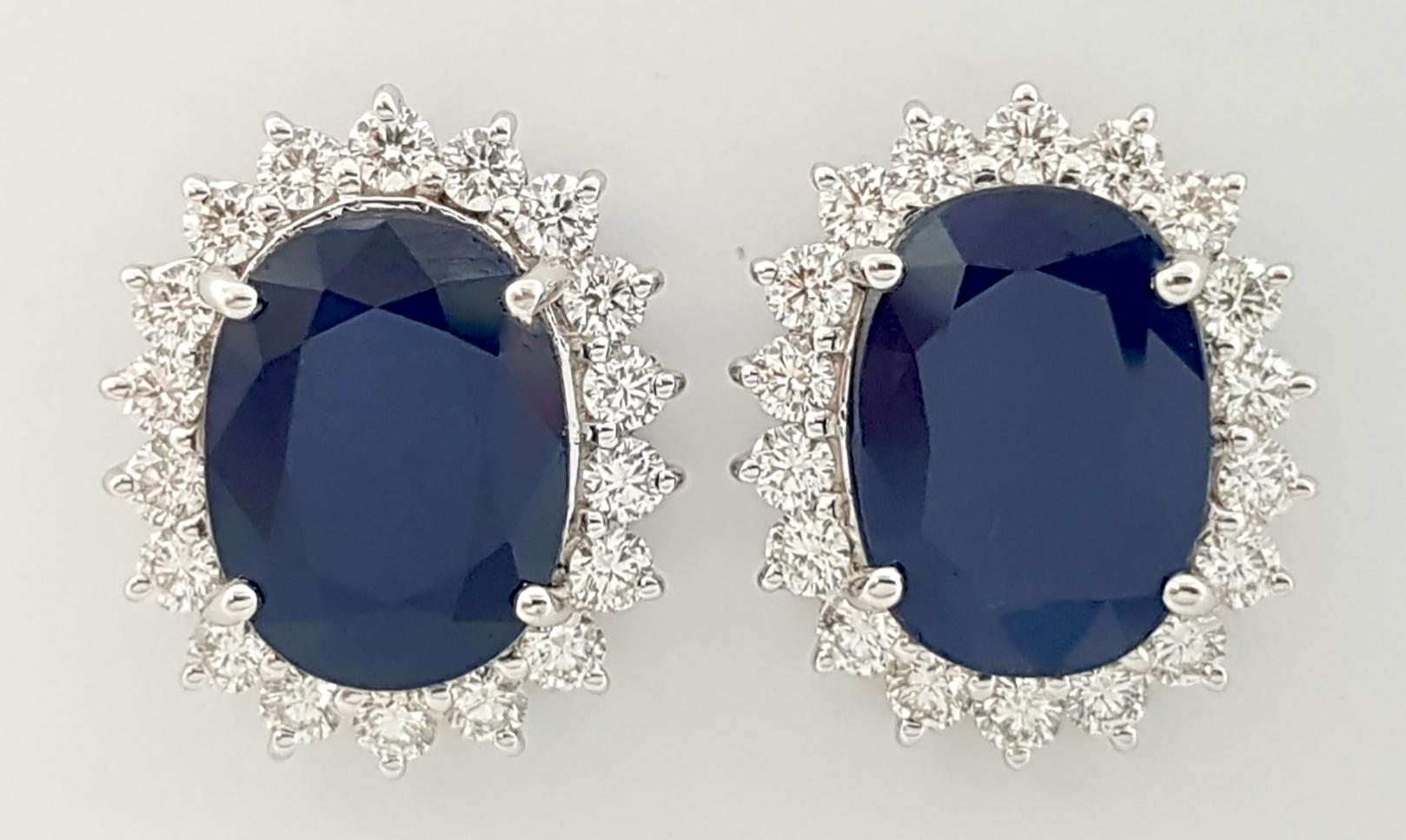Blue Sapphire 8.45 carats with Diamond 1.43 carats Earrings set in 18K White Gold Settings

Width: 1.4 cm 
Length: 1.8 cm
Total Weight: 11.72 grams

