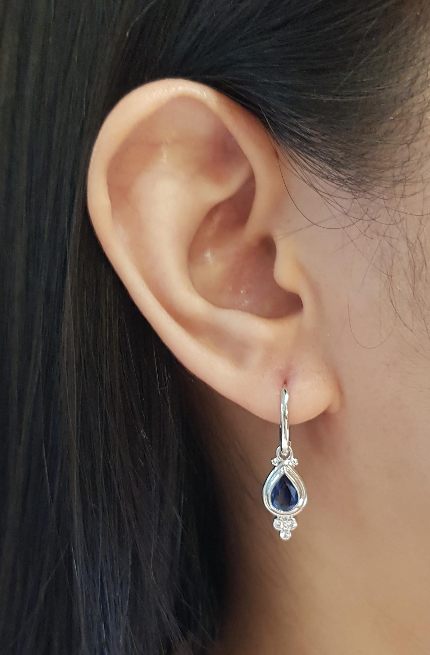 Blue Sapphire 0.79 carats with Diamond 0.07 carat Earrings set in 18K White Gold Settings

Width: 0.8 cm 
Length: 2.7 cm
Total Weight: 4.62 grams

