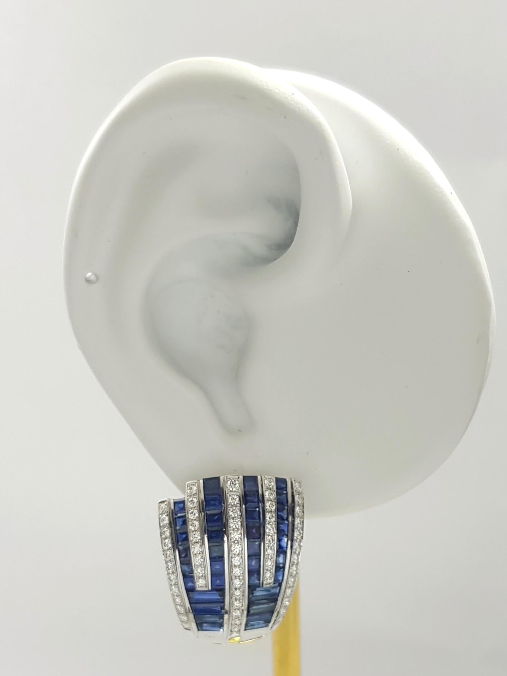 Zaffiro blu 6,35 carati con diamante 1,06 carati Orecchini con montatura in oro bianco 18 carati

Larghezza: 2.0 cm 
Lunghezza: 2.1 cm
Peso totale: 17,74 grammi

