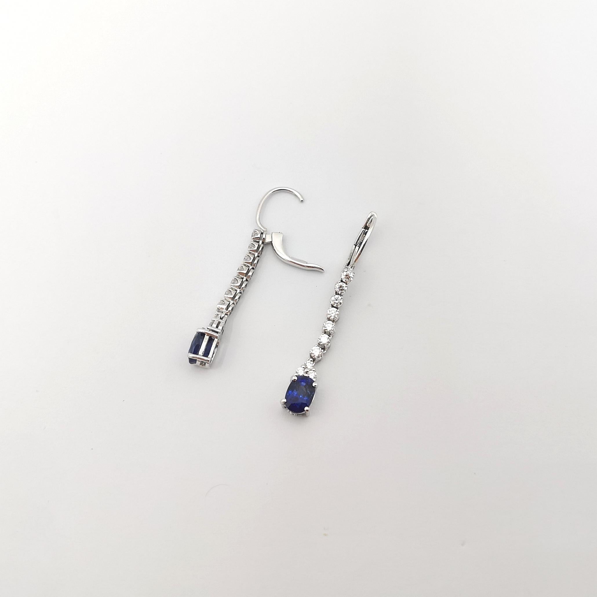 Women's Blue Sapphire with Diamond Earrings set in 18K White Gold Settings For Sale