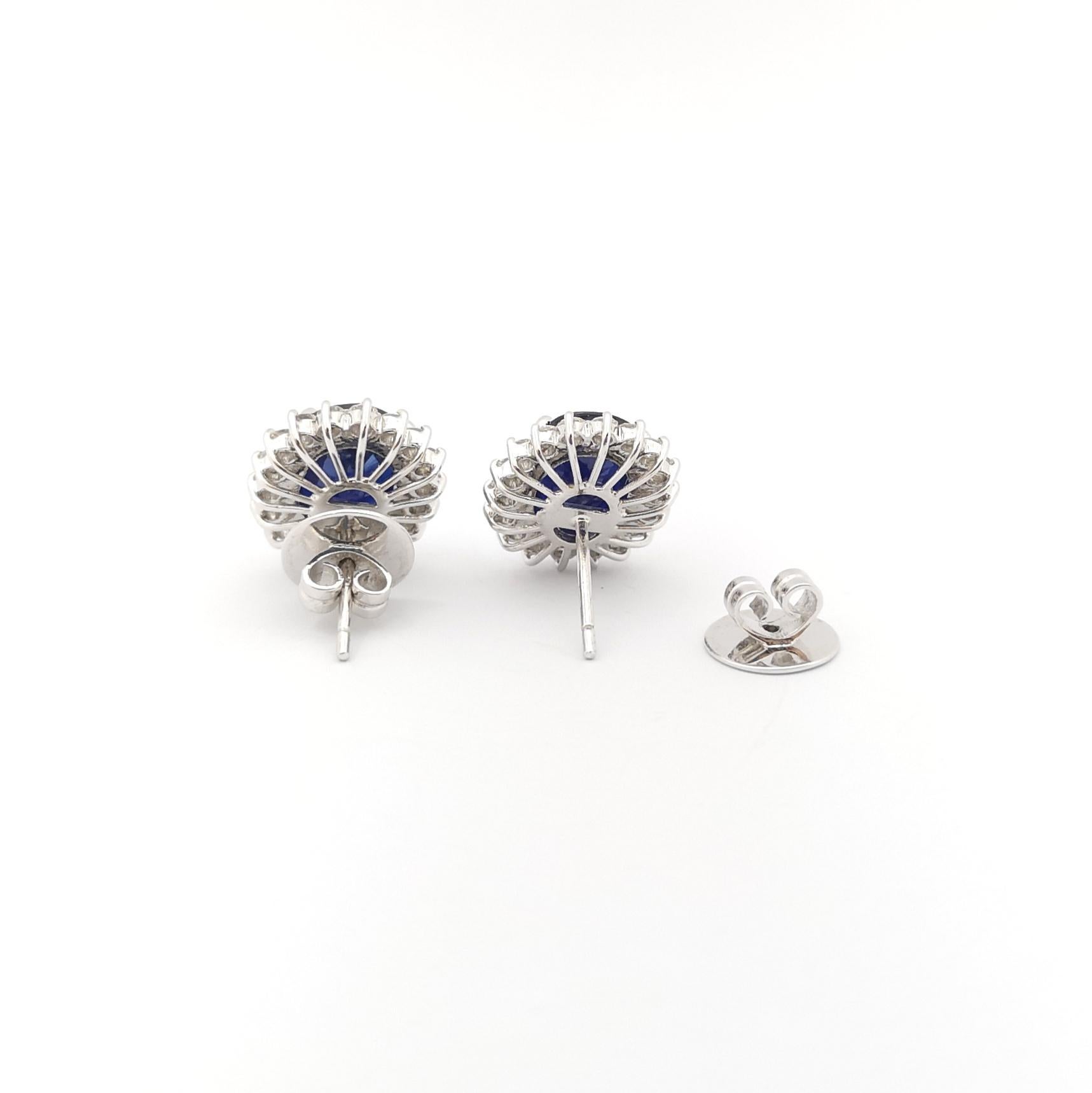 Women's Blue Sapphire with Diamond Earrings set in 18K White Gold Settings For Sale