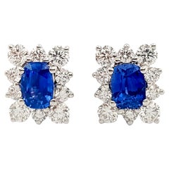 Blue Sapphire with Diamond Earrings set in 18K White Gold Settings