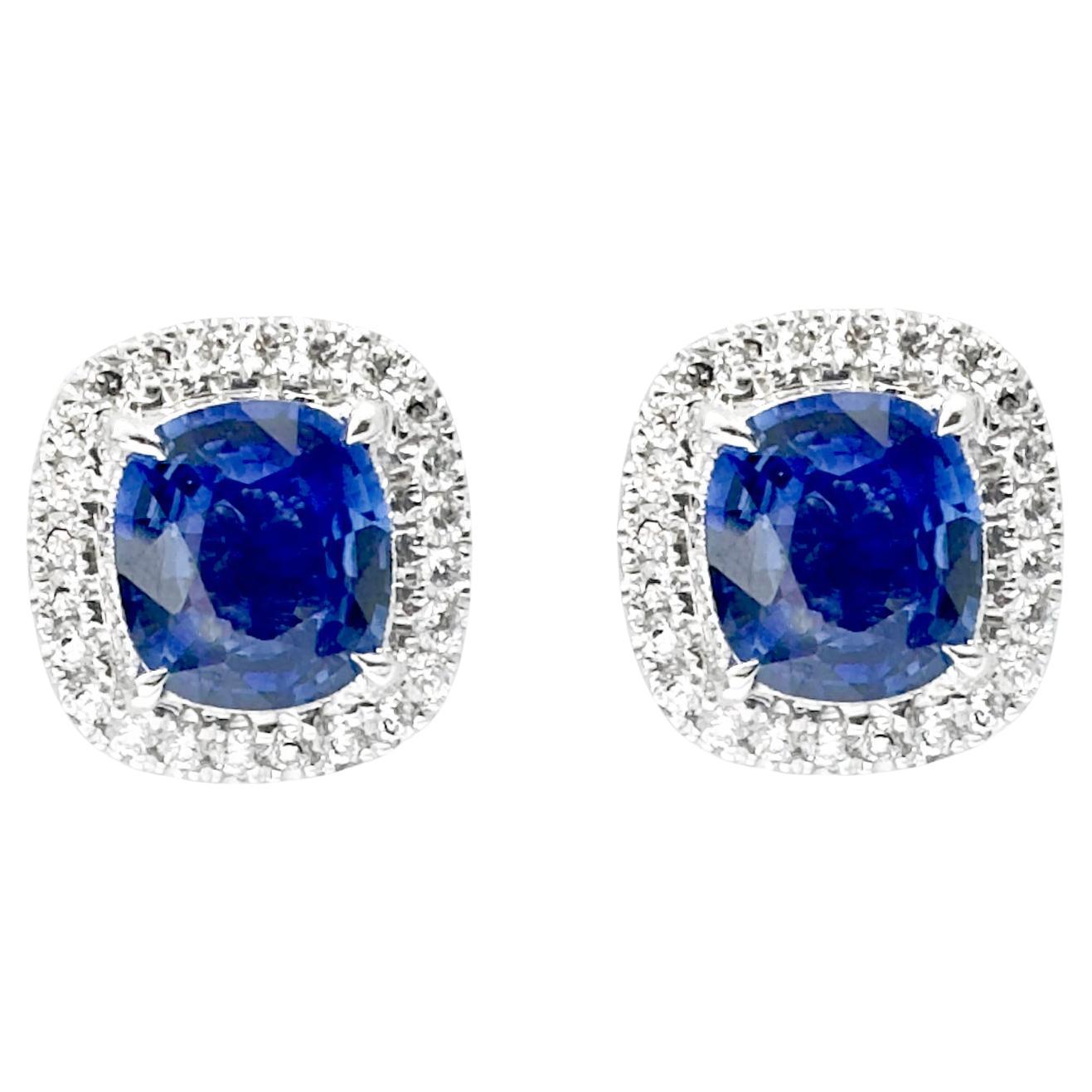 Blue Sapphire with Diamond Earrings set in 18K White Gold Settings