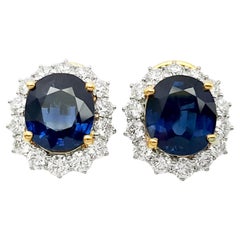 Boucles d'oreilles en or jaune/blanc 18K serties de saphirs bleus et de diamants