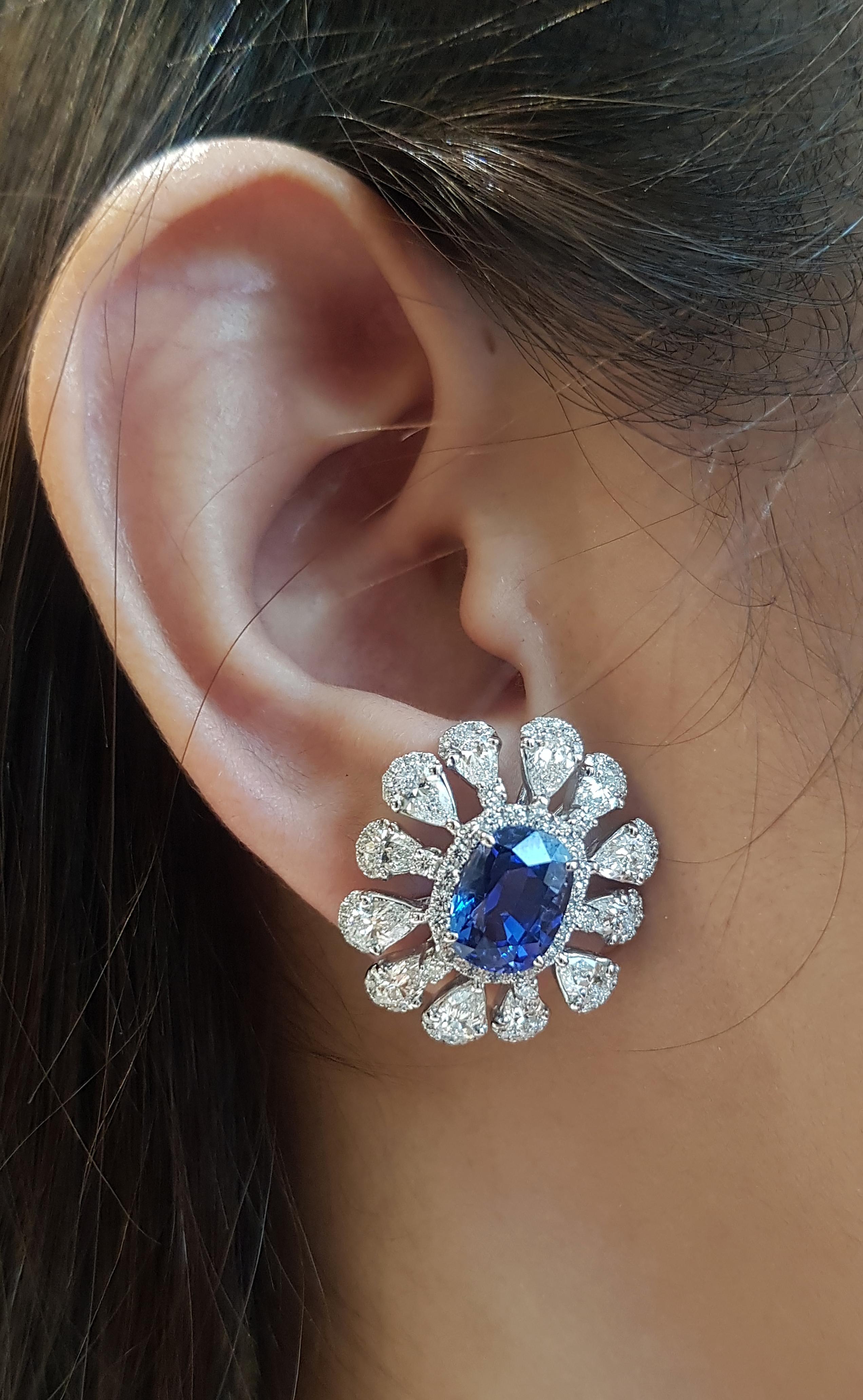Blue Sapphire 9.50 carats with Diamond 5.35 carats Earrings set in Platinum 950 Settings

Width:  2.2 cm 
Length: 2.5 cm
Total Weight: 23.34 grams

