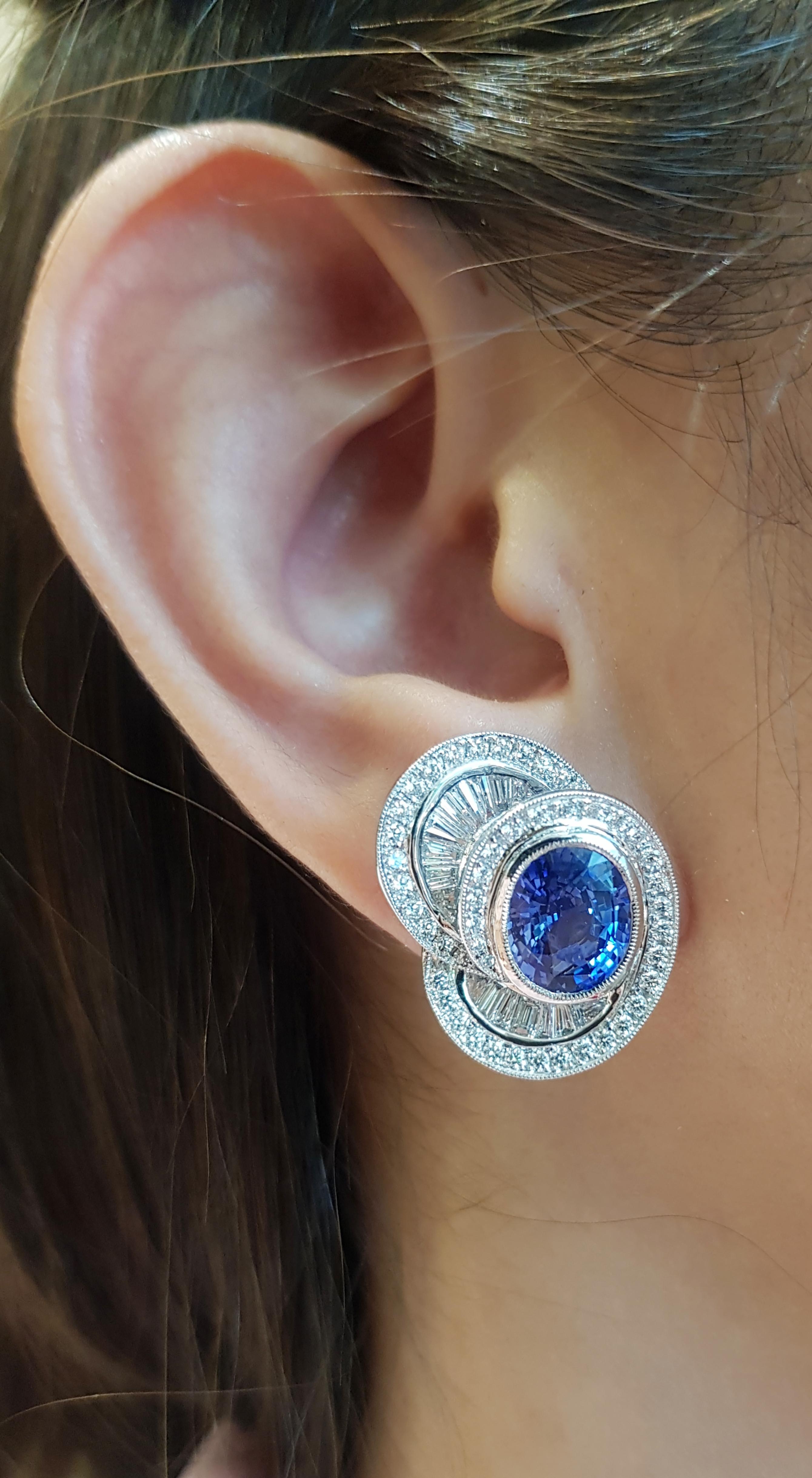 Blue Sapphire 9.22 carats with Diamond 2.09 carats Earrings set in Platinum 950 Settings

Width:  1.9 cm 
Length: 2.4 cm
Total Weight: 20.3 grams

