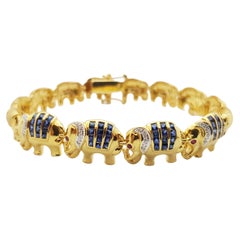 Blue Sapphire with Diamond Elephant Bracelet Set in 18 Karat Gold Settings