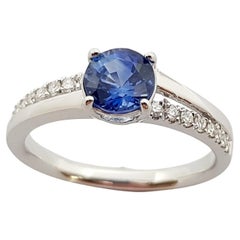Blue Sapphire with Diamond Engagement Ring Set in 18 Karat White Gold Settings