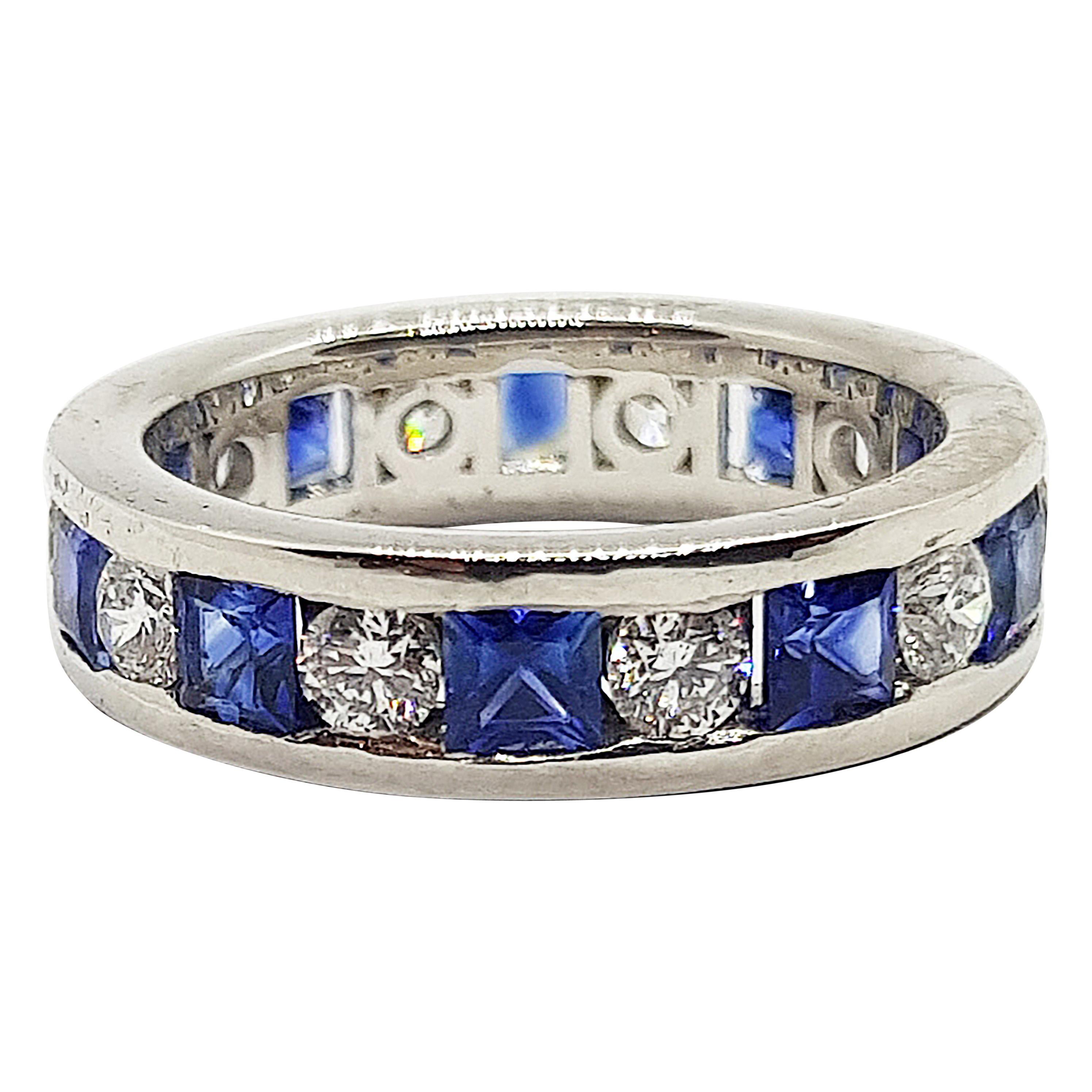 Blue Sapphire with Diamond Eternity Ring Set in 18 Karat White Gold Settings