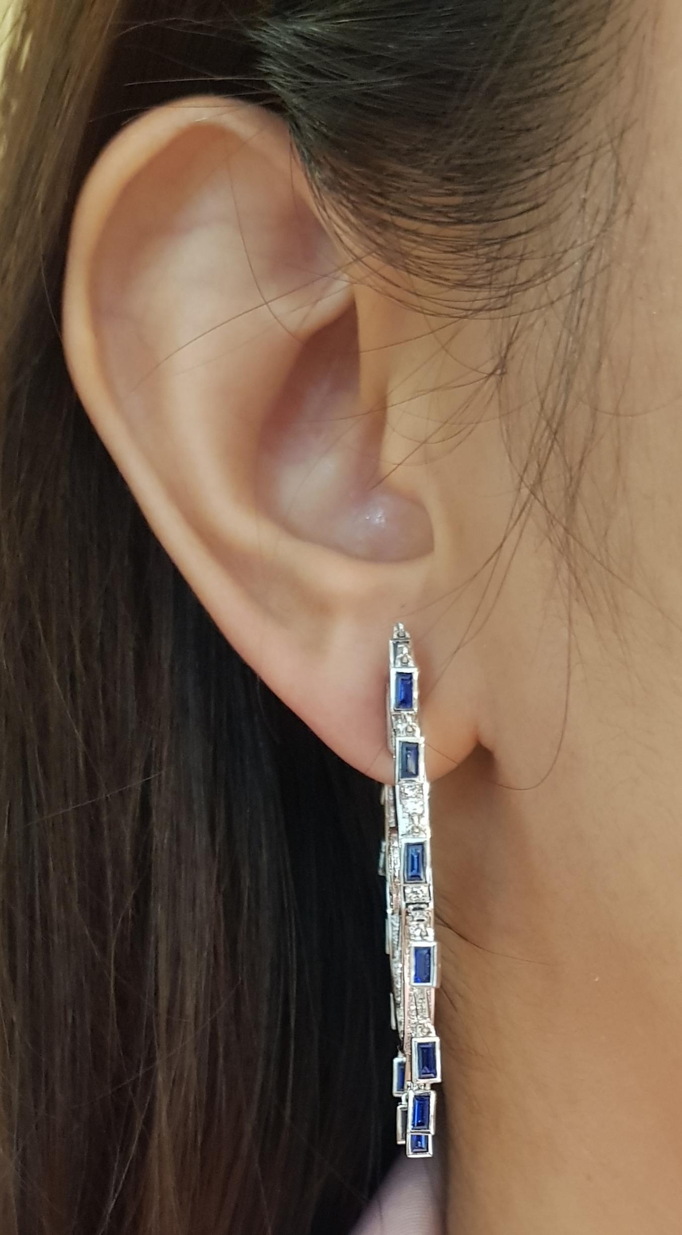 Blue Sapphire 2.63 carats with Diamond 1.59 carats Earrings set in 18 Karat White Gold Settings

Width:  0.4 cm 
Length:  4.5 cm
Total Weight: 16.67 grams

