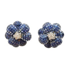 Blue Sapphire with Diamond Flower Earrings Set in 18 Karat Gold Settings
