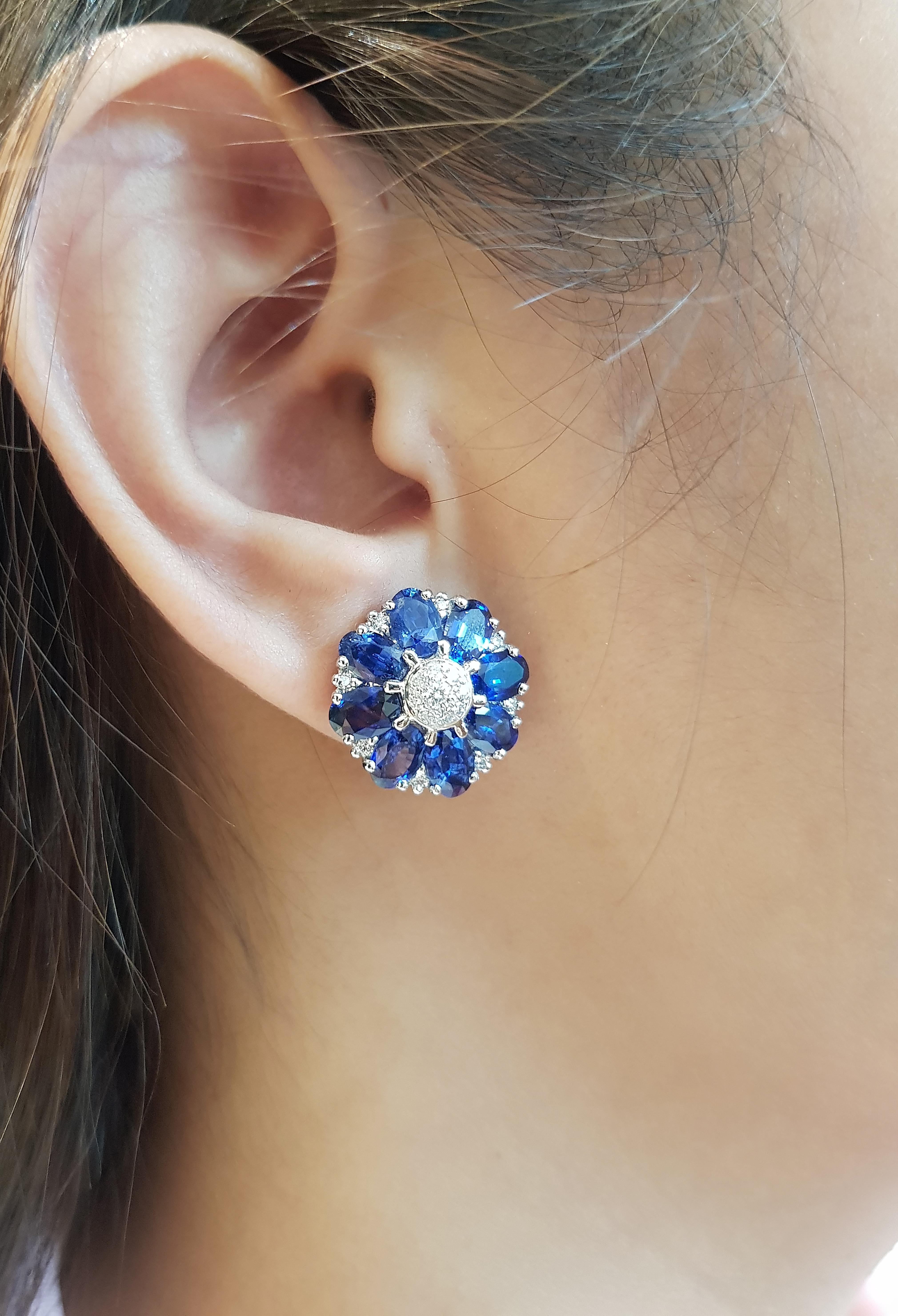 Blue Sapphire 8.30 carats with Diamond 0.39 carats Earrings set in 18 Karat White Gold Settings

Width:  1.7 cm 
Length: 1.7 cm
Total Weight: 13.85 grams

