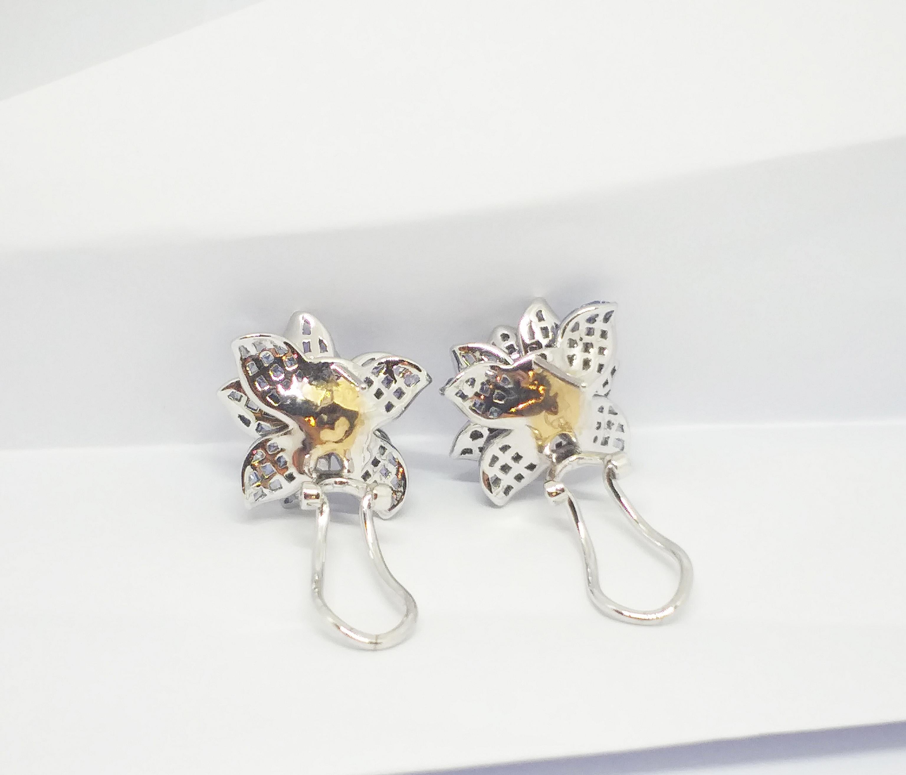 Blue Sapphire with Diamond Flower Earrings set in 18K White Gold Settings For Sale 4