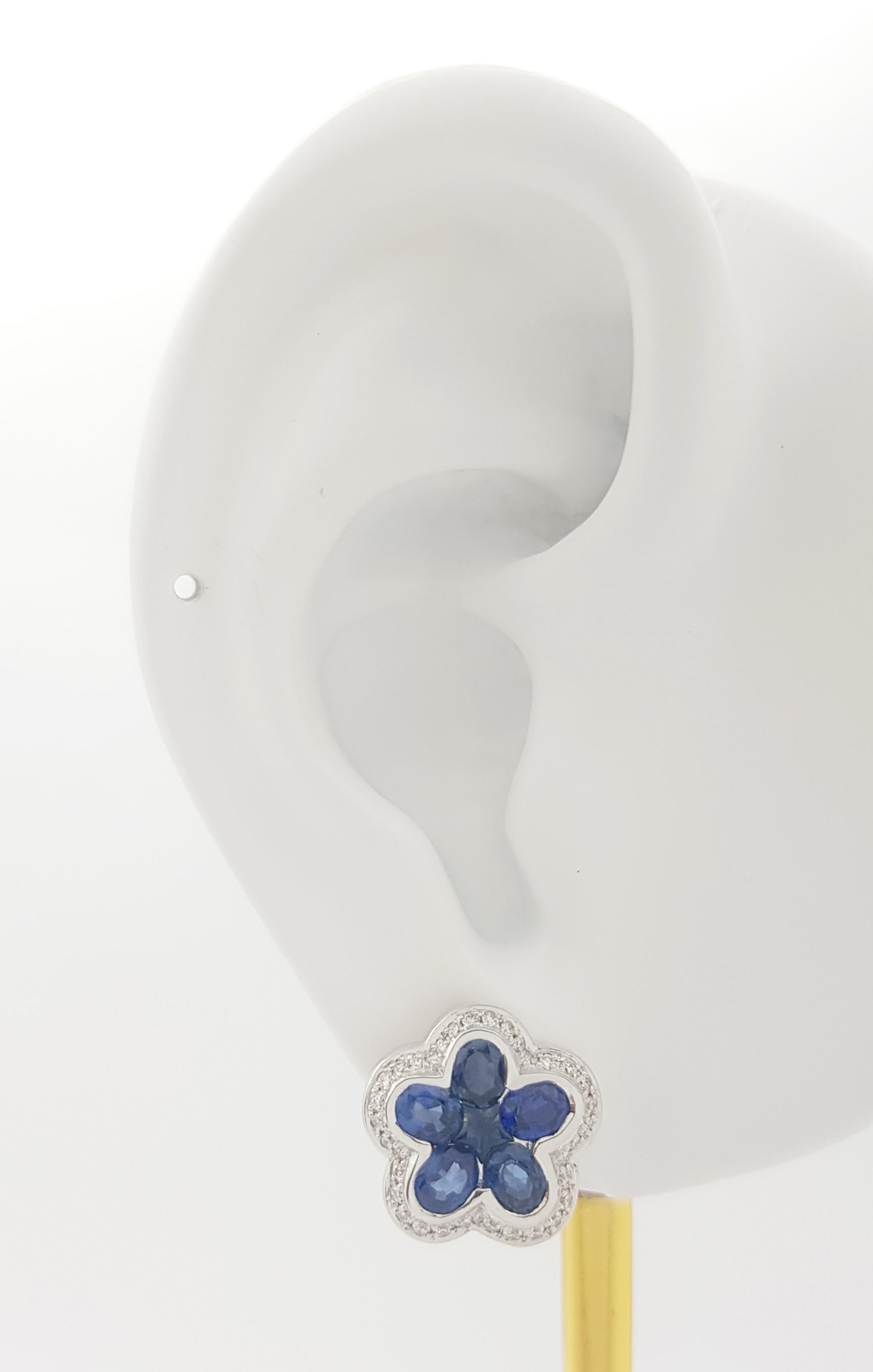 Blue Sapphire 2.90 carats with Diamond 0.25 carat Earrings set in 18K White Gold Settings

Width: 1.3 cm 
Length: 1.3 cm
Total Weight: 8.99 grams

