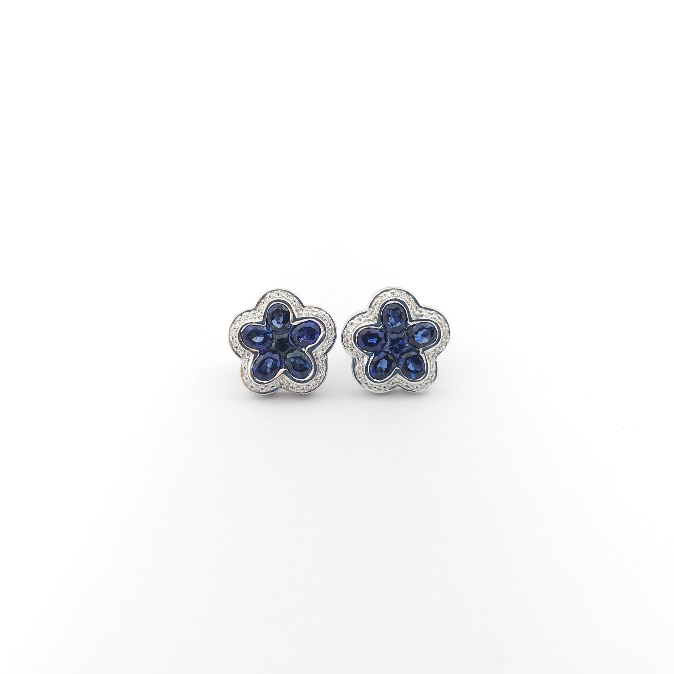 Oval Cut Blue Sapphire with Diamond Flower Earrings set in 18K White Gold Settings For Sale