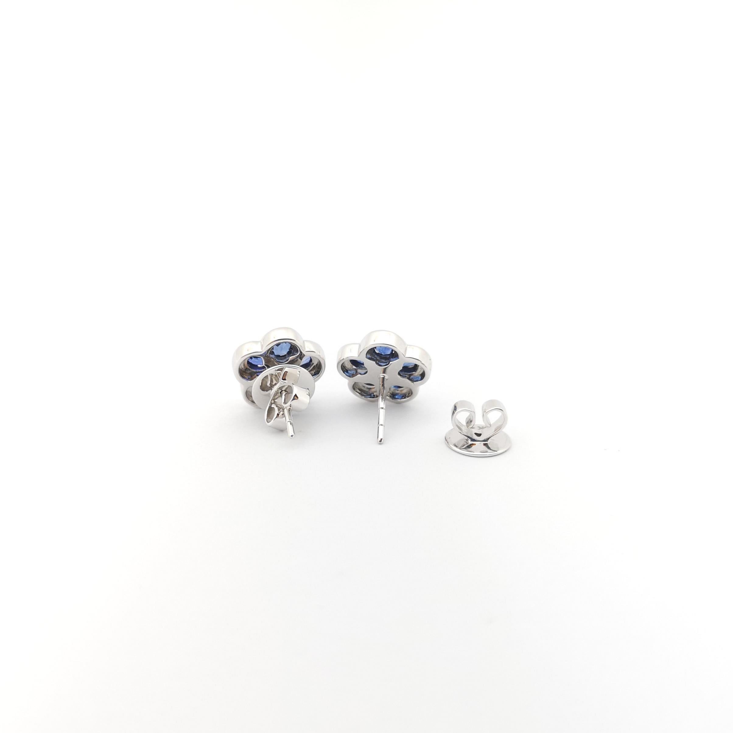 Blue Sapphire with Diamond Flower Earrings set in 18K White Gold Settings For Sale 1