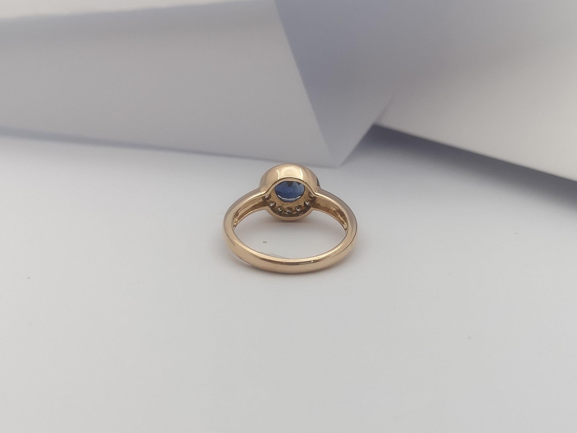 Blue Sapphire with Diamond Halo Ring Set in 18 Karat Rose Gold Settings For Sale 2