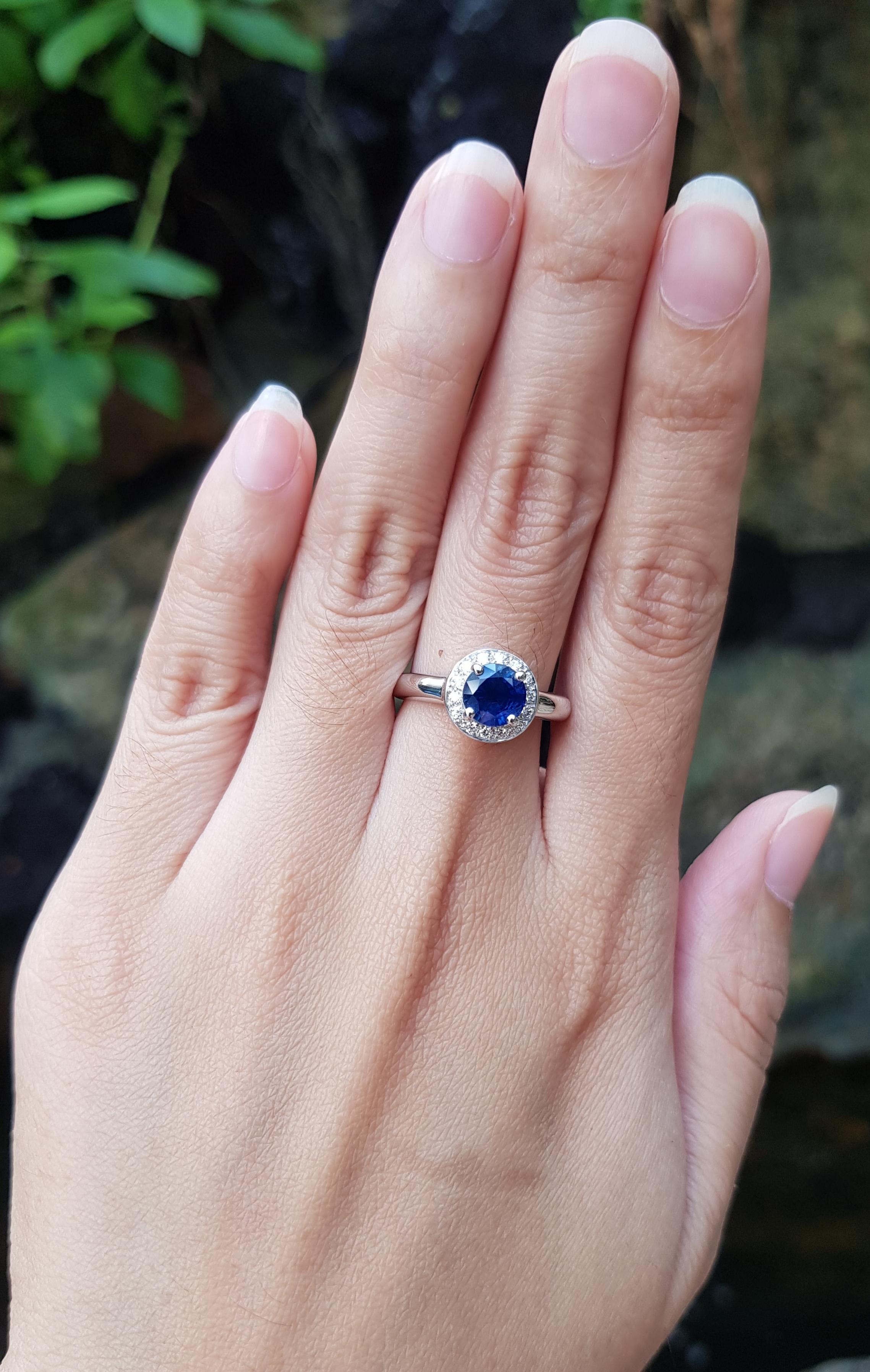 Blue Sapphire 1.59 carats with Diamond 0.14 carat Ring set in 18 Karat White Gold Settings

Width:  1.0 cm 
Length: 1.0 cm
Ring Size: 53
Total Weight: 4.84 grams


