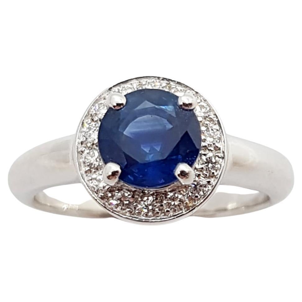 Blue Sapphire with Diamond Halo Ring Set in 18 Karat White Gold Settings For Sale