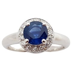 Blue Sapphire with Diamond Halo Ring Set in 18 Karat White Gold Settings