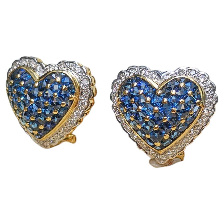 Blue Sapphire 7.55 carats with Diamond 0.55 carat Earrings set in 18 Karat Gold Settings

Width:  2.0 cm 
Length: 1.8 cm
Total Weight: 11.17 grams

