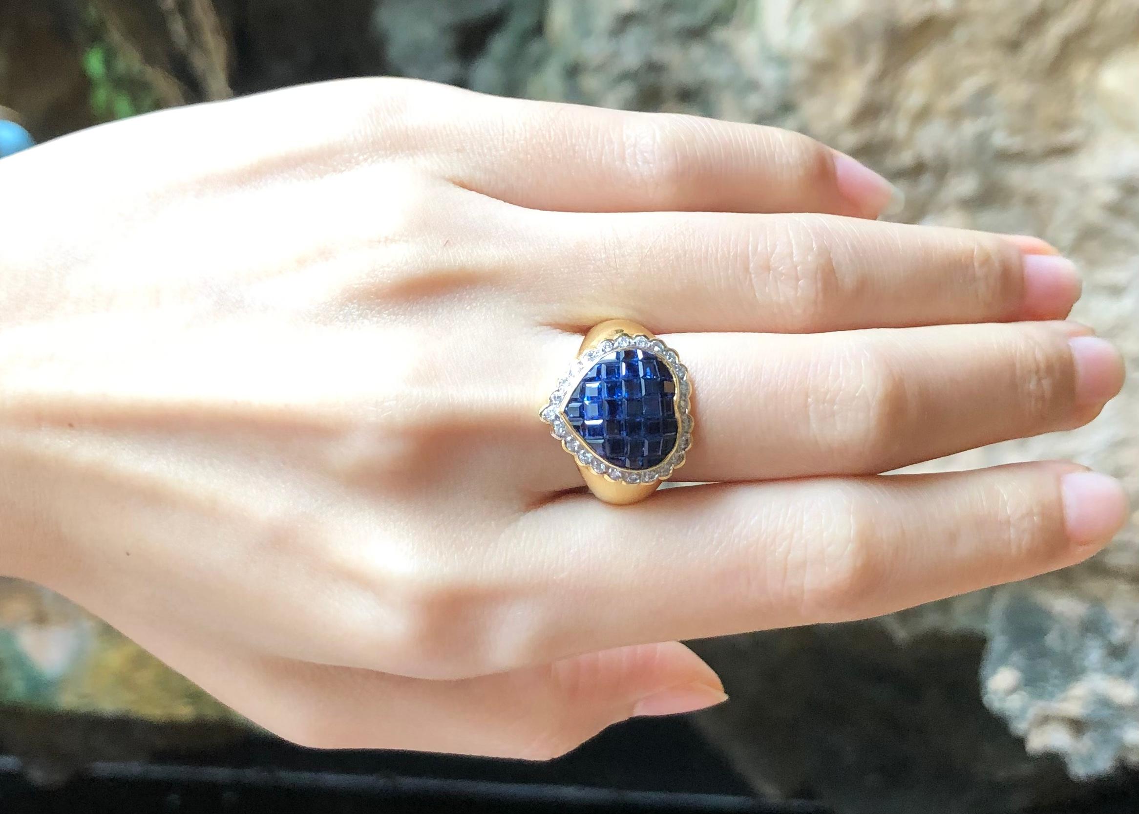 Taille carrée Bague en forme de cœur sertie d'un saphir bleu et de diamants, en or 18 carats en vente