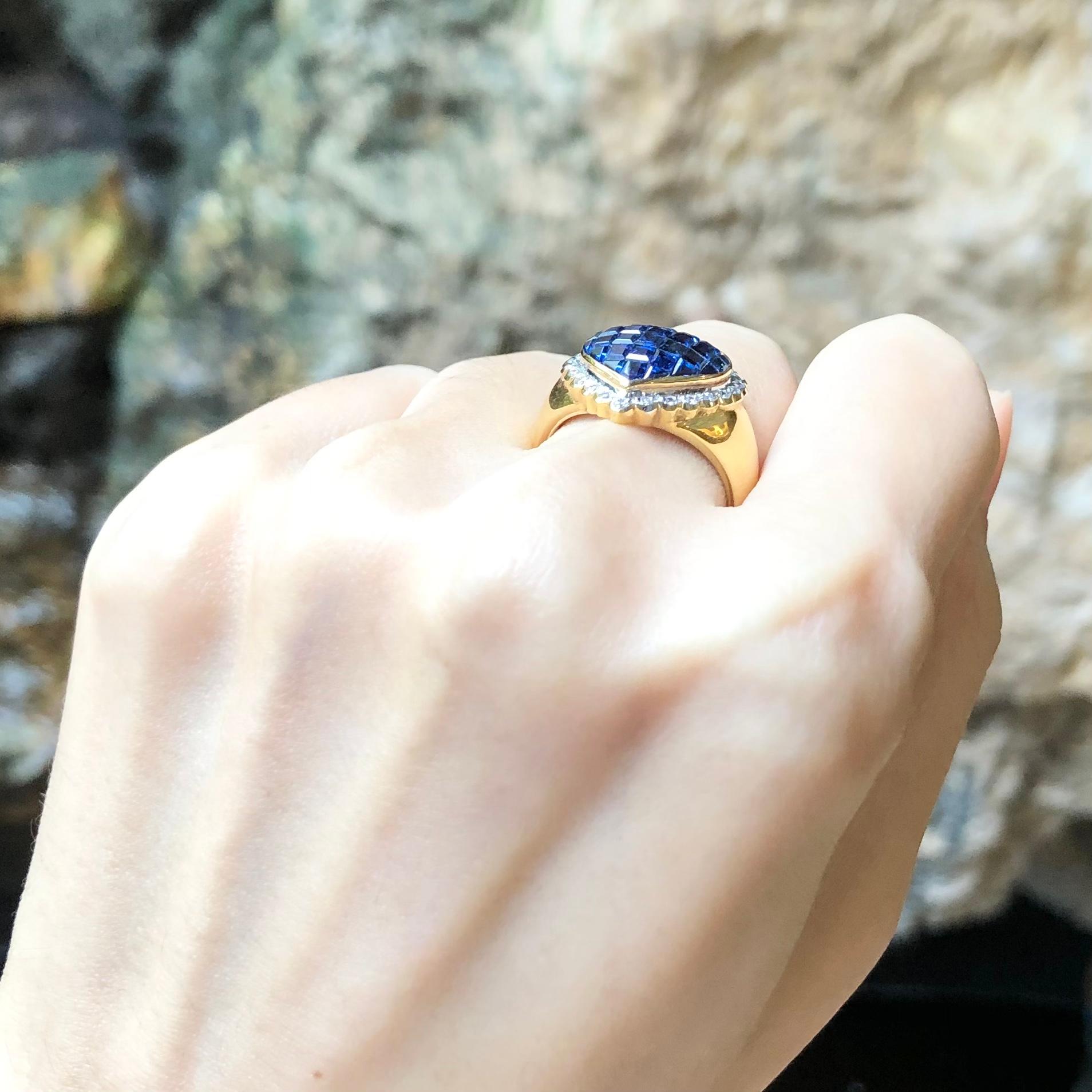 Contemporary Blue Sapphire with Diamond Heart Ring Set in 18 Karat Gold Settings For Sale