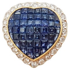 Blue Sapphire with Diamond Heart Ring Set in 18 Karat Gold Settings