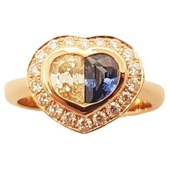 Bague en forme de cœur sertie d'un saphir bleu et de diamants, en or rose 18 carats