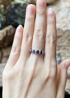 Blue Sapphire with Diamond ing set in 18K White Gold Settings