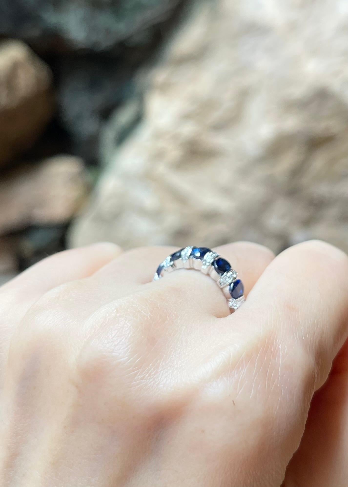 Women's Blue Sapphire with Diamond ing set in 18K White Gold Settings For Sale