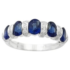 Blue Sapphire with Diamond ing set in 18K White Gold Settings