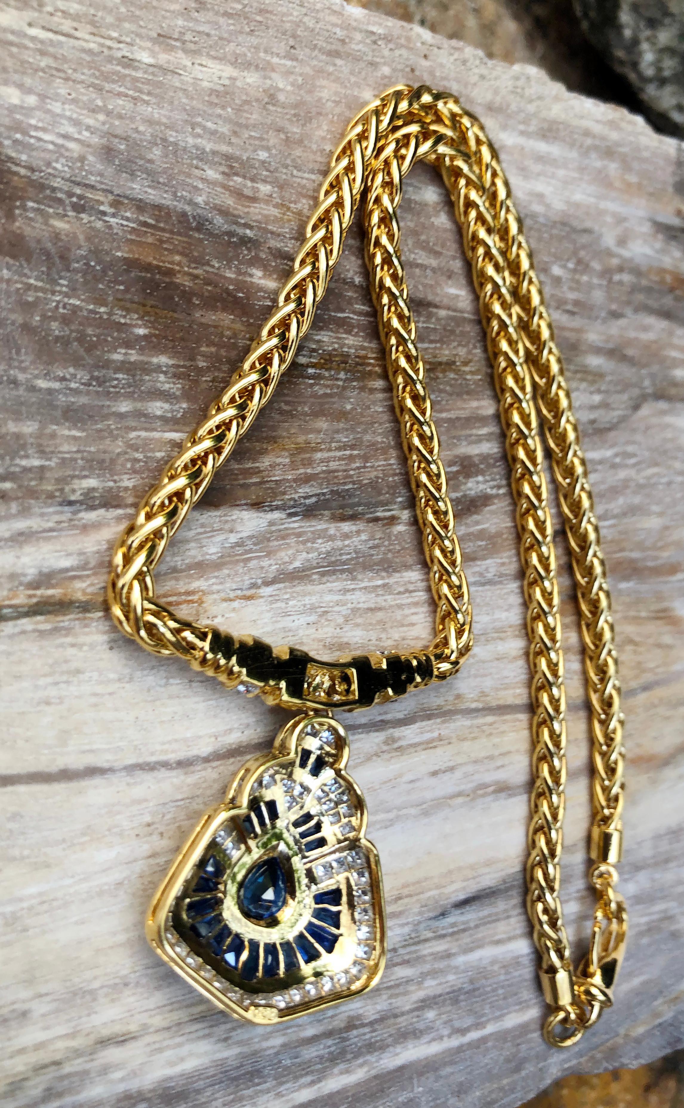 Taille mixte Collier en or 18 carats serti d'un saphir bleu et de diamants en vente
