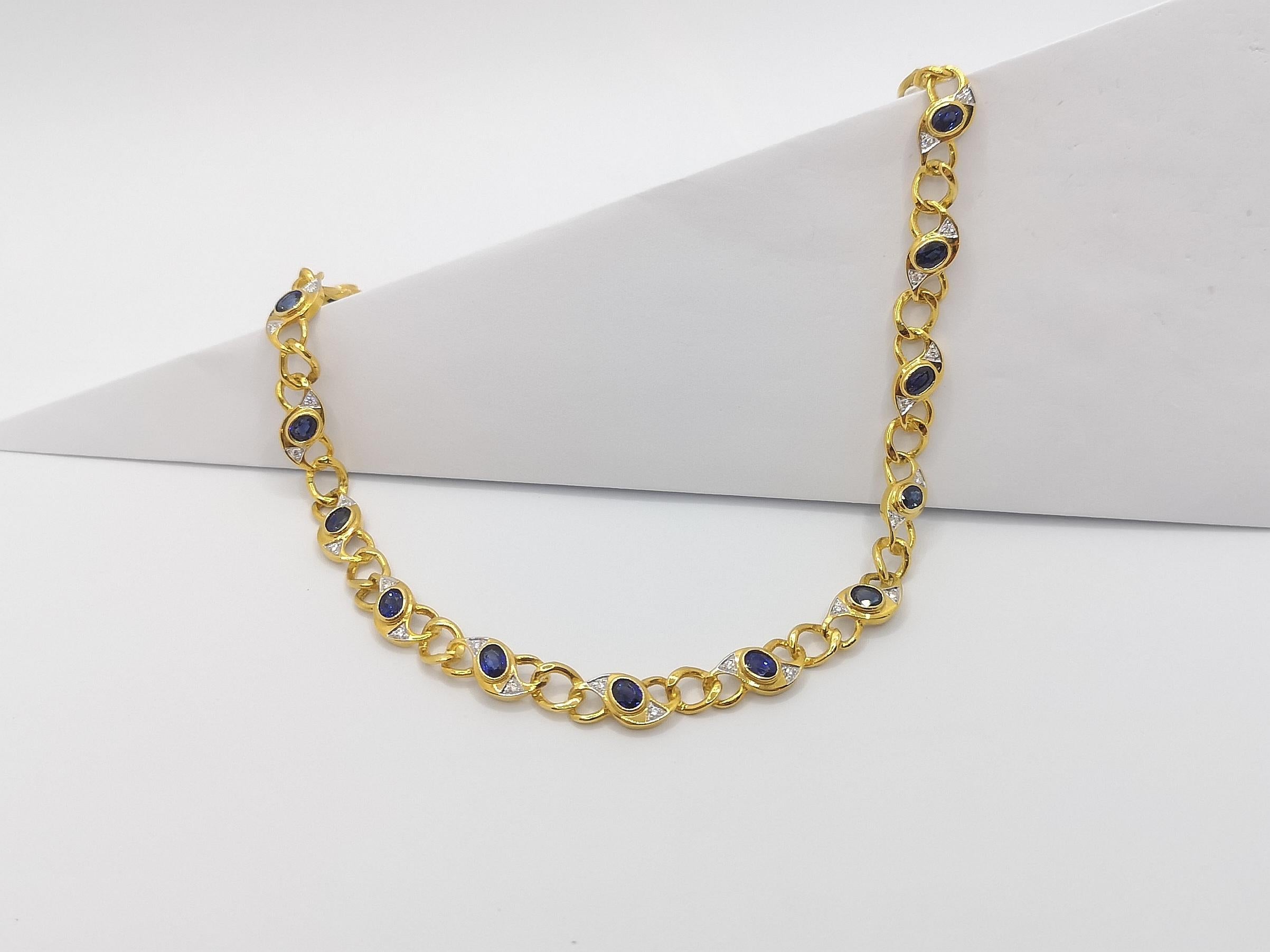 Collier en or 18 carats serti d'un saphir bleu et de diamants Pour femmes en vente