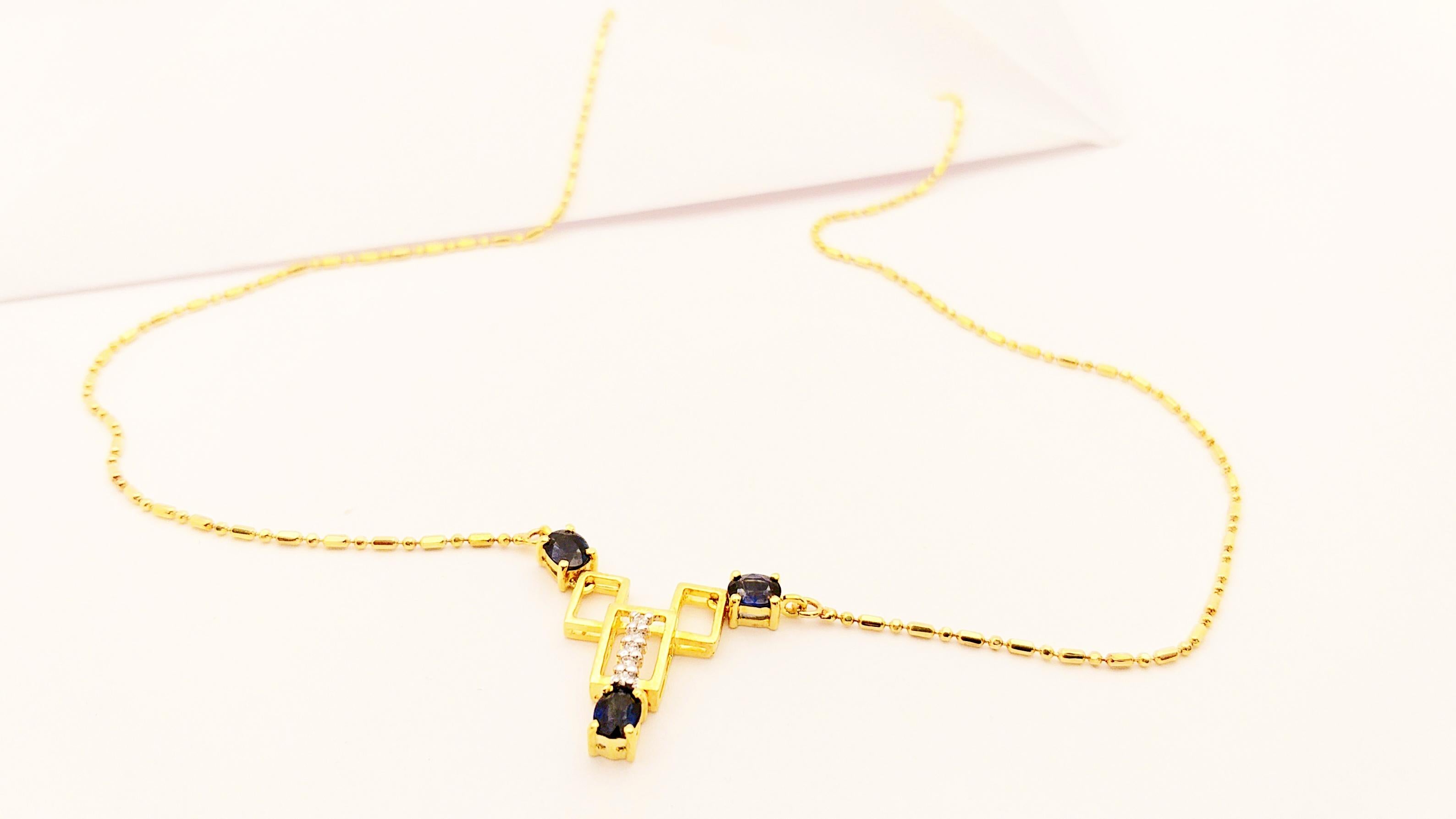 Collier en or 18 carats serti d'un saphir bleu et de diamants en vente 1