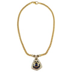 Collana di zaffiri blu e diamanti con montatura in oro 18 carati