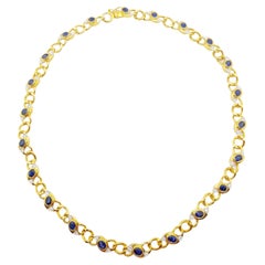 Halskette mit blauem blauem Saphir und Diamant in 18 Karat Goldfassung
