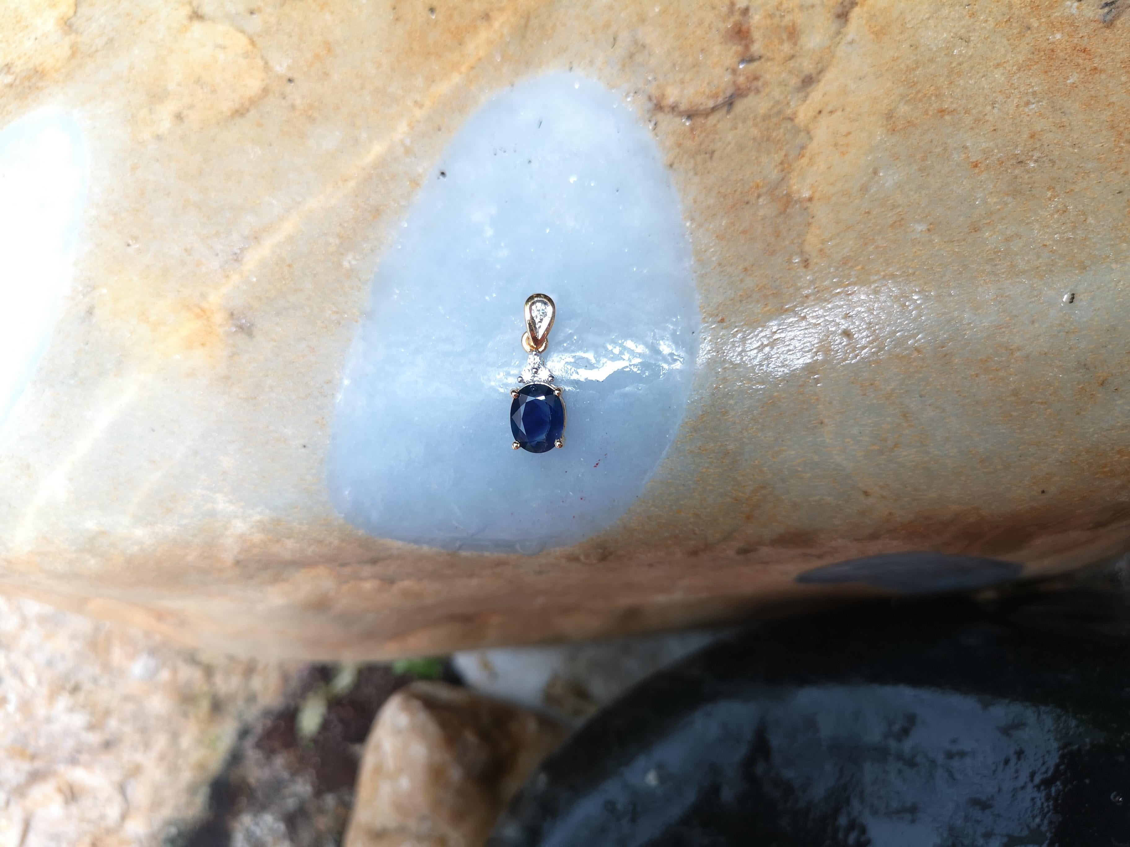 Oval Cut Blue Sapphire with Diamond Pendant Set in 18 Karat Gold Settings For Sale