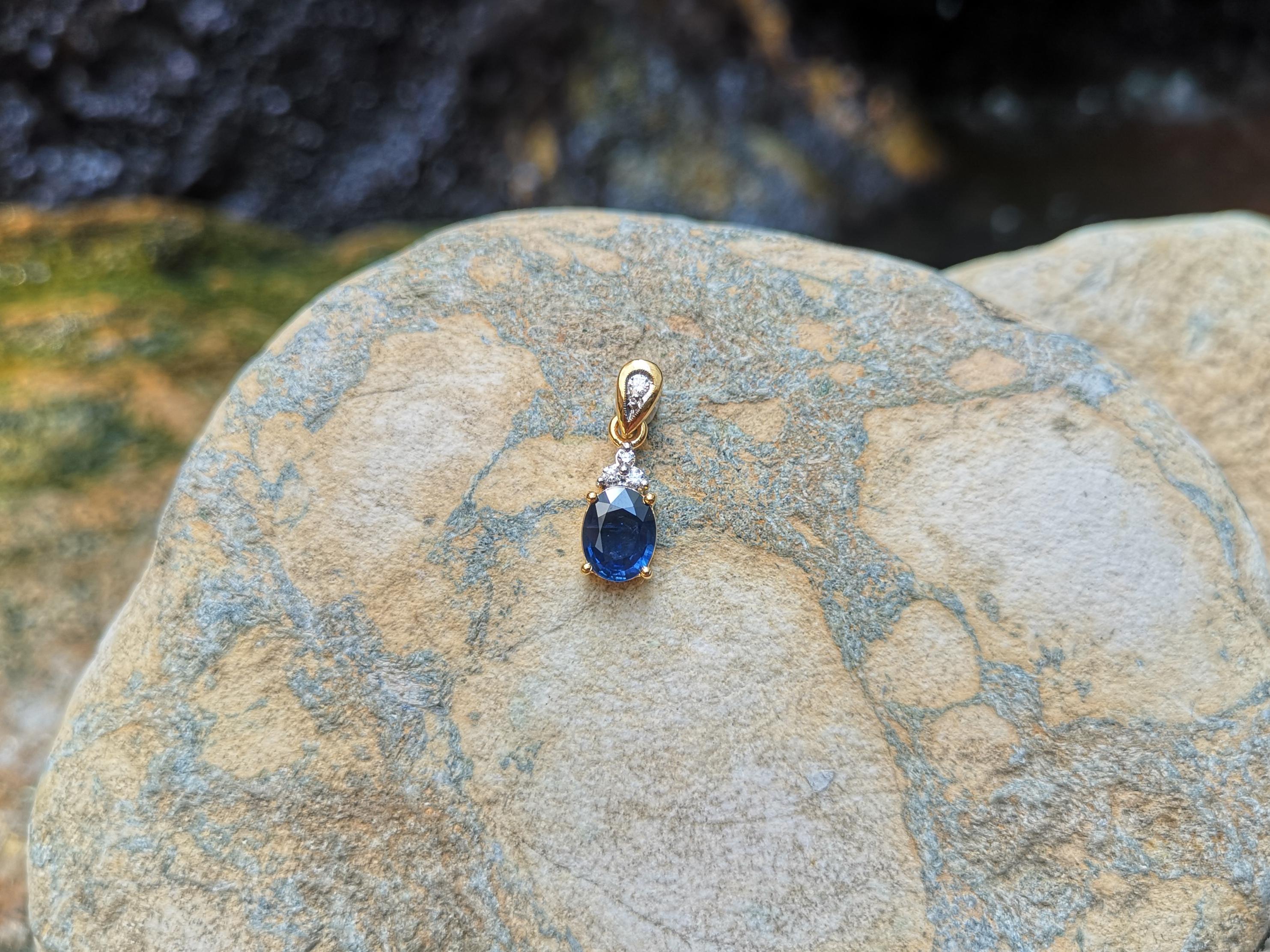 Contemporary Blue Sapphire with Diamond Pendant Set in 18 Karat Gold Settings