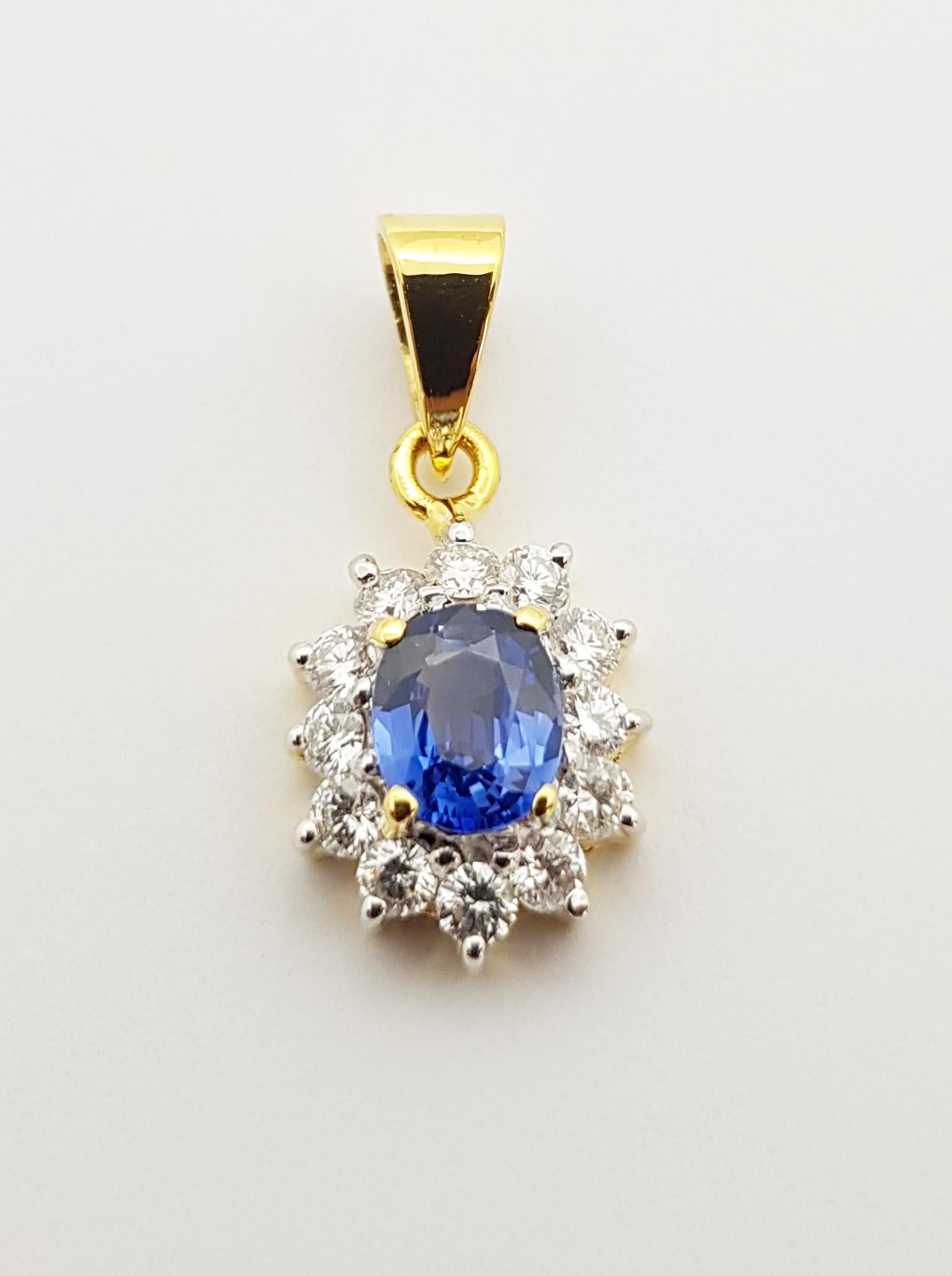 Contemporary Blue Sapphire with Diamond Pendant Set in 18 Karat Gold Settings For Sale
