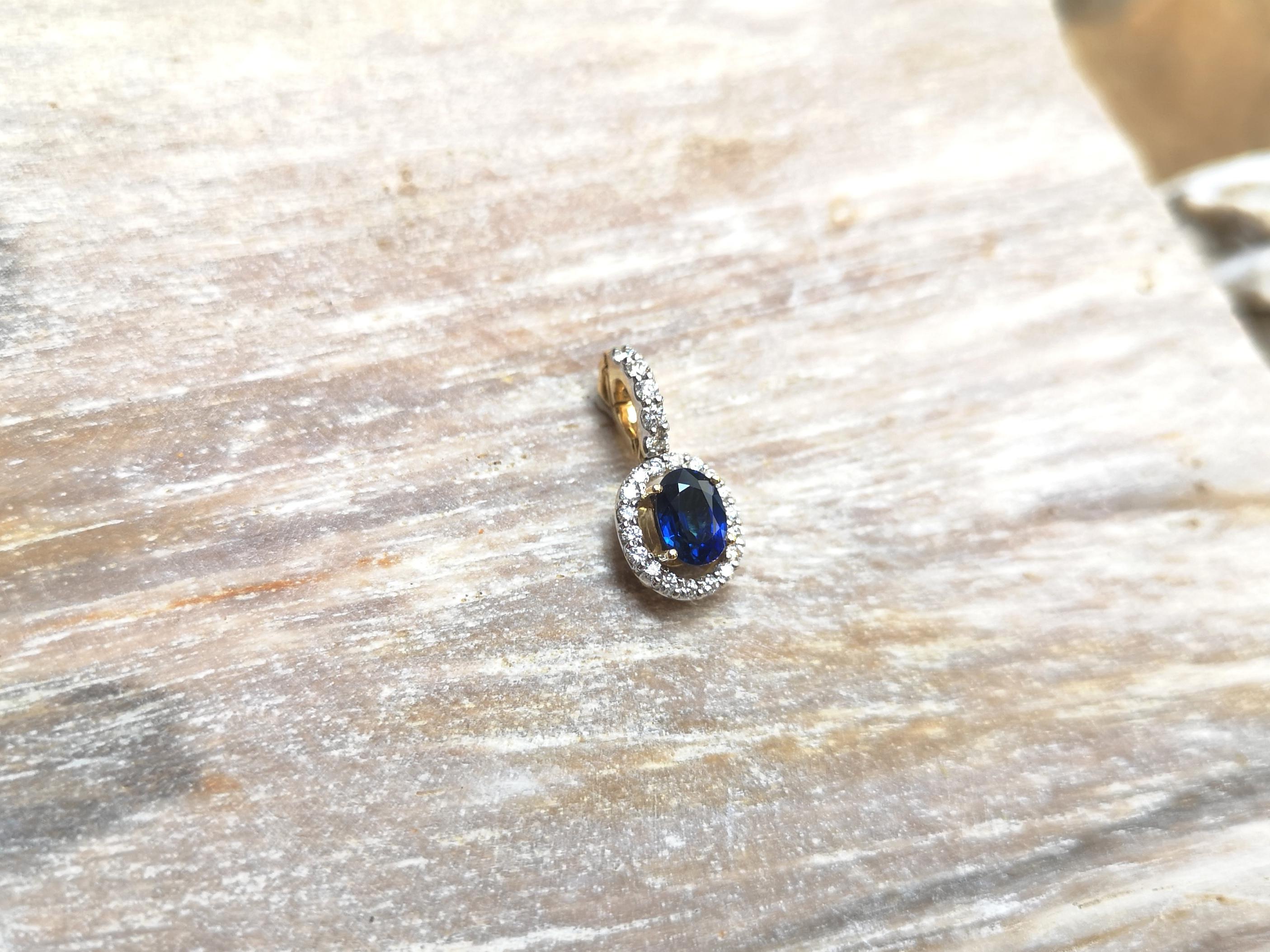 Oval Cut Blue Sapphire with Diamond Pendant Set in 18 Karat Gold Settings