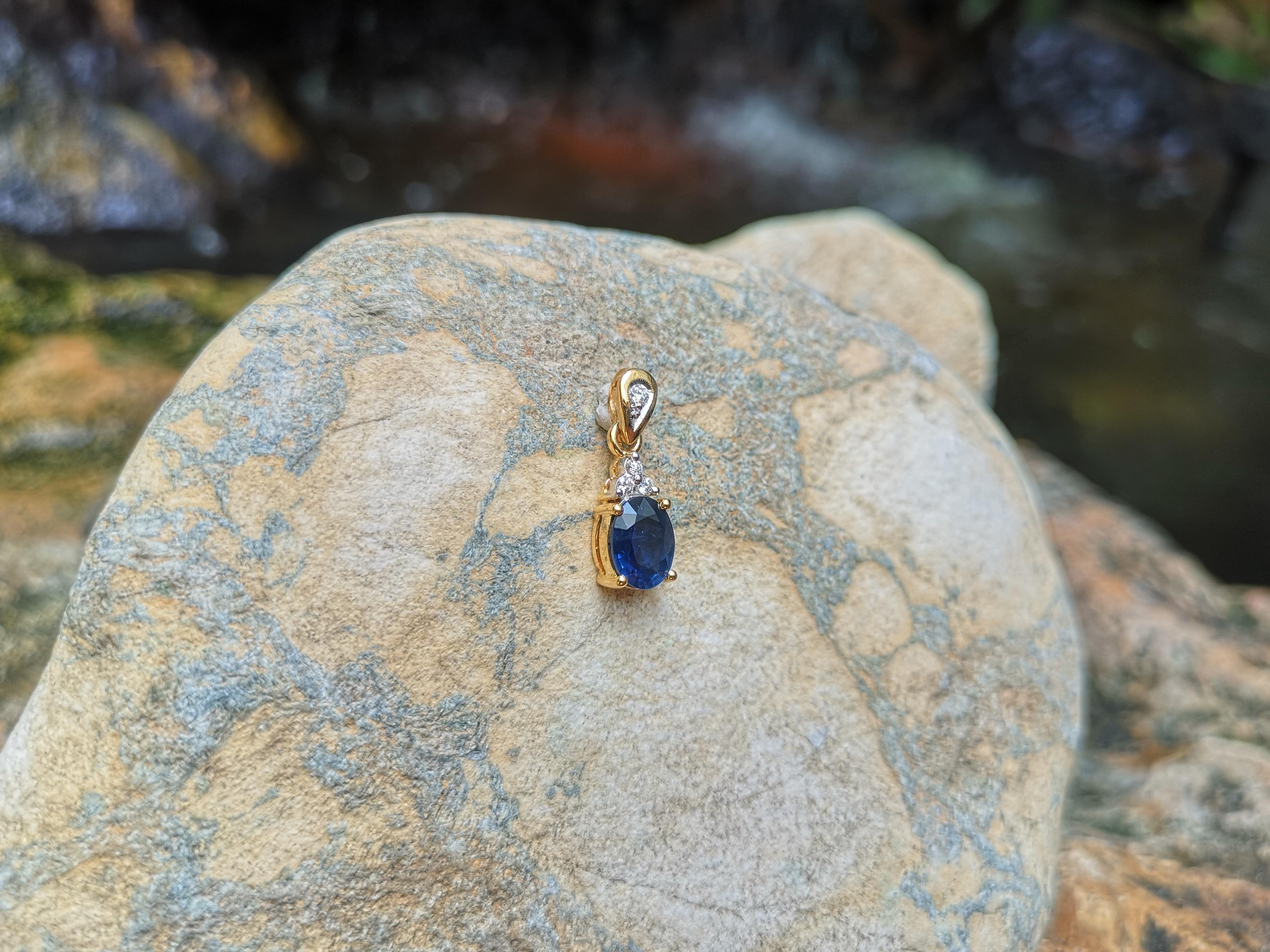 Oval Cut Blue Sapphire with Diamond Pendant Set in 18 Karat Gold Settings