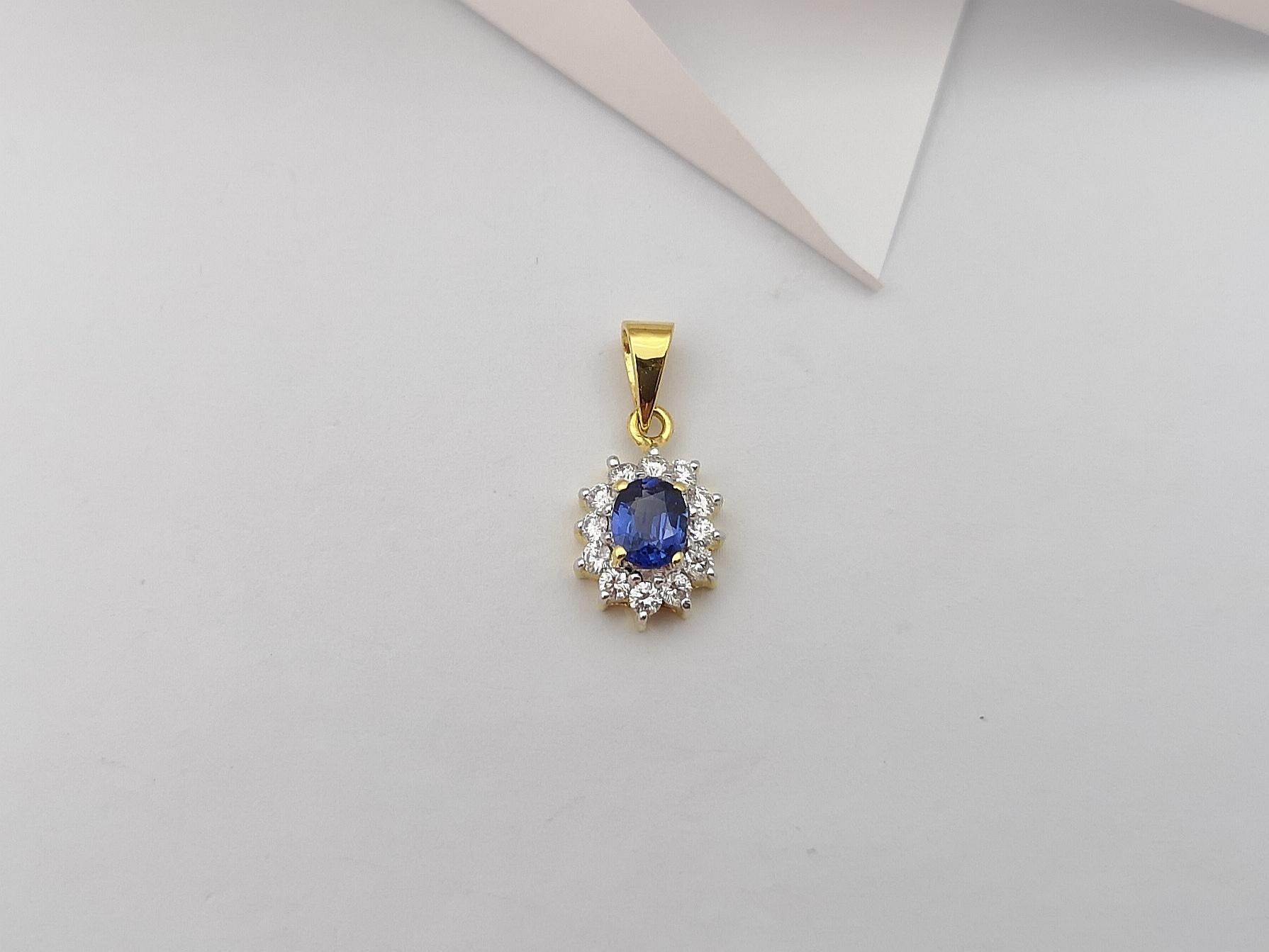 Women's Blue Sapphire with Diamond Pendant Set in 18 Karat Gold Settings For Sale