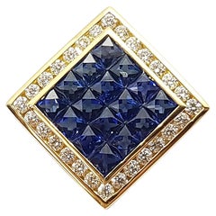 Ciondolo con zaffiro blu e diamante incastonato in oro 18 carati